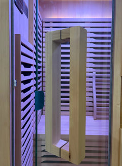 Zoppinh Blisspod Milano Full Spectrum Sauna in Canadian Hemlock wood with glass door, designed for relaxing sauna sessions.