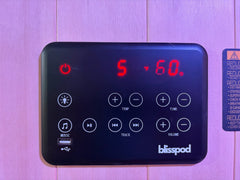 Zoppinh Blisspod Milano Full Spectrum Sauna made of Canadian Hemlock wood, featuring a sleek design and glass door.