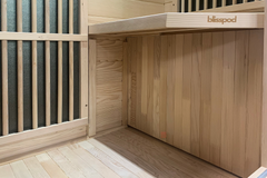 Zoppinh Blisspod Vienna Far Infrared Sauna with wood interior and control panel, designed for home wellness and relaxation.