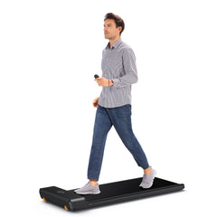 Foldable Kingsmith WalkingPad A1 Pro under desk treadmill, compact design, black with control panel, suitable for home or office use.