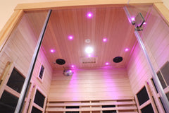 Zoppinh Finnmark FD-3 full spectrum infrared sauna with seating for four, featuring wooden interior and glass door panels.