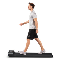 Foldable Kingsmith WalkingPad A1 Pro treadmill for under desk walking, with sleek black design and compact size for easy storage.