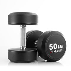 Pair of XMARK round commercial urethane dumbbells, 50 lb weights, showcasing durable free weights for strength training.