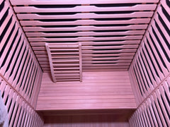 Zoppinh Blisspod Milano full spectrum sauna made of Canadian Hemlock wood, showcasing its sleek, modern design with glass door and interior seating.
