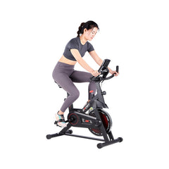 Indoor exercise upright bike by FLIPSTYLEZLLC with a sleek design, adjustable seat, and digital display for silent cardio workouts.