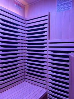 Zoppinh Blisspod Milano full spectrum sauna made of Canadian Hemlock wood, featuring a sleek, modern design with glass doors.