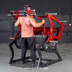 Plate loaded Muscle D Fitness Pro Strength Power Hack Squat machine with padded seat and weight plates for commercial gym use