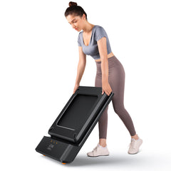 Foldable Kingsmith WalkingPad A1 Pro treadmill for under desk use, showing its sleek design and compact size in a home office setting.