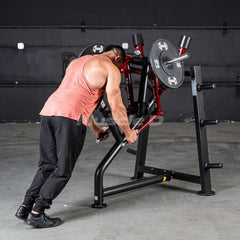 Muscle D Power Leverage V2 Plate-Loaded Rear Delt Machine from Muscle D Fitness in a commercial gym setting, showing the machine's frame and handles.