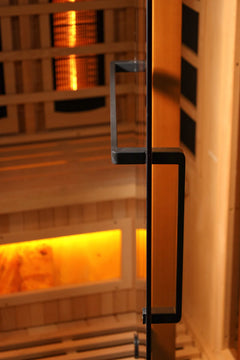 Golden Designs Inc. GDI-8035-03 2025 Reserve Edition 3-person full spectrum sauna with Himalayan salt bar, black towel bar handle visible