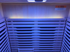 Zoppinh Blisspod Milano full spectrum sauna made of Canadian Hemlock, showcasing the wooden interior and heating panels.