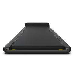 Foldable Kingsmith WalkingPad A1 Pro treadmill for under desk exercise, showing the sleek design and compact form in a home setting.