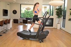 Pro 6 Arcadia Air Runner non-motorized treadmill with adjustable incline and wide running surface for versatile workouts.