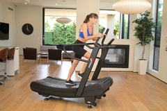 Pro 6 Arcadia Air Runner non-motorized treadmill with adjustable handrails and textured running surface for cardio workouts.