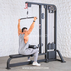 Muscle D Fitness Classic V2 selectorized lat pulldown and low row combo machine with padded seating and adjustable weights.
