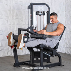 Muscle D Fitness Classic V2 selectorized leg extension and seated leg curl combo machine with padded seat and weight stacks.