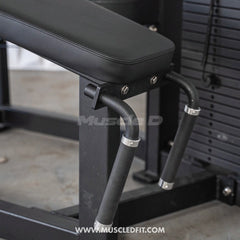 Muscle D Fitness Classic V2 selectorized prone leg curl machine for targeted hamstring workouts in commercial gyms.