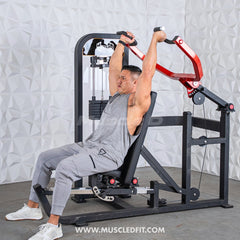 Muscle D Fitness Classic V2 selectorized multi-press chest and shoulder press machine with padded seats and adjustable weight stacks.