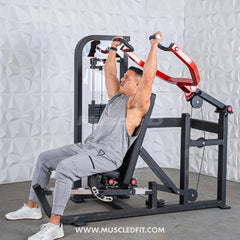 Muscle D Fitness Classic V2 selectorized multi-press machine with chest and shoulder press stations, featuring padded seats and handles.