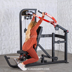 Muscle D Fitness Classic V2 selectorized multi-press machine for chest and shoulder workouts, with padded seats and adjustable handles.