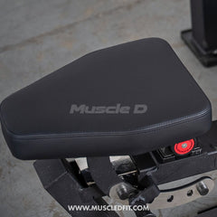 Muscle D Fitness Classic V2 selectorized multi-press chest and shoulder press machine with padded seats and adjustable weight stacks.