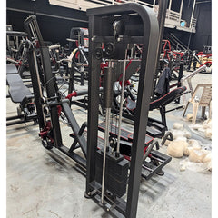 Muscle D Fitness Classic V2 Selectorized Glute Kick Machine for targeted glute and hip muscle workouts in a commercial gym setting.