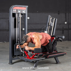 Muscle D Fitness Classic V2 Selectorized Glute Kick Machine for targeting glutes in commercial gym settings.