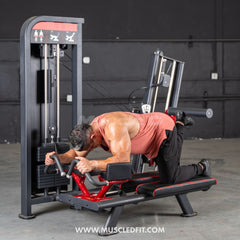Muscle D Fitness Classic V2 Selectorized Glute Kick machine with padded seat and handles for targeted glute muscle workouts.