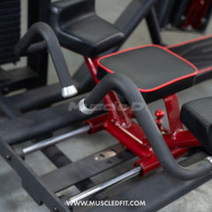 Muscle D Fitness Classic V2 Selectorized Glute Kick Machine for gym workouts, featuring padded support and adjustable settings.