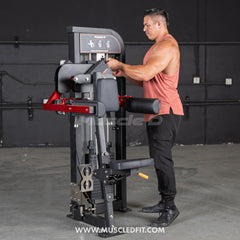 Muscle D Fitness Classic V2 Selectorized Lateral Raise Machine for shoulder isolation, featuring padded seat and adjustable arm pads.
