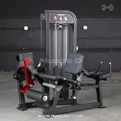 Muscle D Fitness Classic V2 Leg Extension and Prone Leg Curl combo machine with selectorized weight system and padded seats.