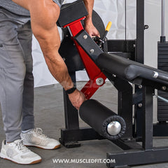 Muscle D Fitness Classic V2 selectorized leg extension machine with padded seat and adjustable leg pad for targeted quadriceps workout.