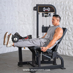 Muscle D Fitness Classic V2 Selectorized Leg Extension Machine with padded seat and adjustable leg pad for strength training.