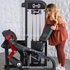 Muscle D Fitness Classic V2 selectorized leg extension machine with padded seat and adjustable leg pad for targeted leg workouts.