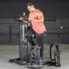 Muscle D Classic V2 selectorized multi-hip machine with padded supports and adjustable weights for glute and hip training.