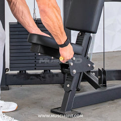 Muscle D Fitness Classic V2 Selectorized Shoulder Press machine with padded seat and adjustable handles for upper body workout.