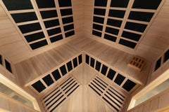 Zoppinh Blisspod Vienna corner infrared sauna with spacious interior and wooden benches, designed for relaxing far infrared therapy.