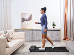 Foldable Kingsmith WalkingPad A1 Pro treadmill for under desk use, featuring a sleek black design and compact size for easy storage.