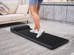 Foldable KingSmith WalkingPad A1 Pro treadmill for under desk use, showing its compact design and control panel.