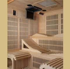 Golden Designs Inc. Elite Monaco near zero EMF far infrared sauna with wooden interior and digital control panel.