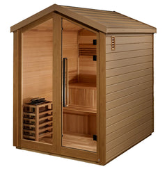 Golden Designs Kaarina 6-person outdoor traditional sauna with wooden exterior and glass door, set in a backyard setting.