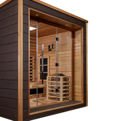 Golden Designs Visby 3-person indoor-outdoor PureTech hybrid sauna with full spectrum lighting, shown in a modern home setting.