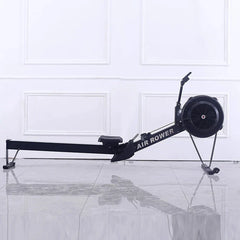 24 Hour Sport rowing machine for fitness, with adjustable resistance and digital display, used for cardiovascular workouts.