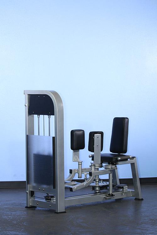 Muscle D Fitness DF-IO dual function inner and outer thigh exercise machine with padded seat and resistance settings.