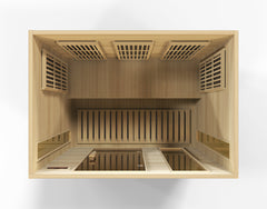 Golden Designs Inc. 3-person low EMF FAR infrared sauna with wooden interior and control panel, designed for relaxing wellness.