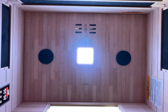 Zoppinh Finnmark FD-3 infrared sauna with four-person capacity, featuring full spectrum infrared panels and modern home design.