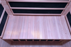 Zoppinh Finnmark FD-3 full spectrum infrared sauna with four-person capacity, featuring wooden interior and built-in control panel.