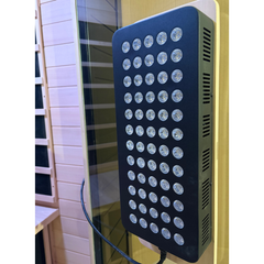Finnmark FD-3 four-person infrared sauna by Zoppinh with wooden interior and glass door, designed for home relaxation.