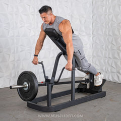 Plate loaded Excel T-Bar Row machine by Muscle D Fitness for commercial gyms, featuring a sturdy T-bar and weight plates.