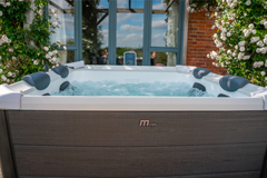 Zoppinh MSPA OSLO rame Series hot tub with sleek design, seating area, and built-in jets for relaxing spa experience.